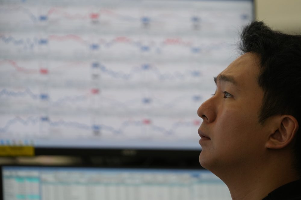 Asian shares climb after US stocks rise at the start of a holiday-shortened week