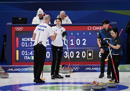 Olympics-Curling-Italians get mixed doubles title defence underway, Britain beat Estonia