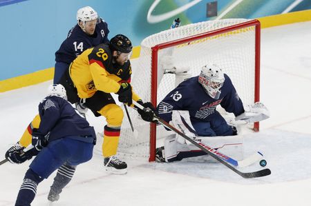 Olympics-Ice hockey-Germany beat France to book Slovakia quarter-final clash