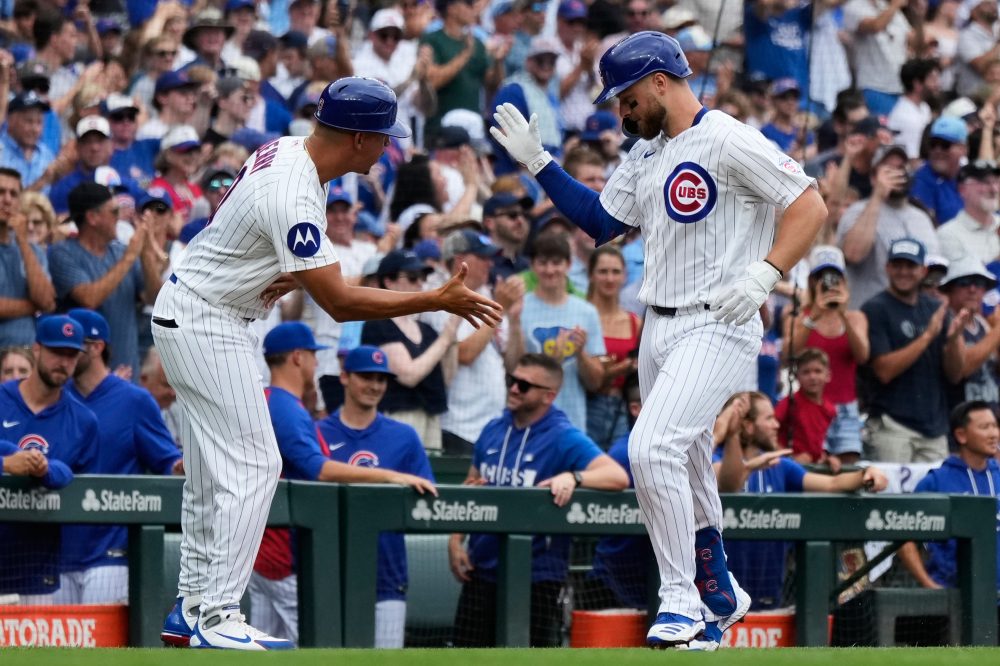 Former Cubs player Anthony Rizzo snares Michael Busch’s home run ball in the Wrigley Field bleachers