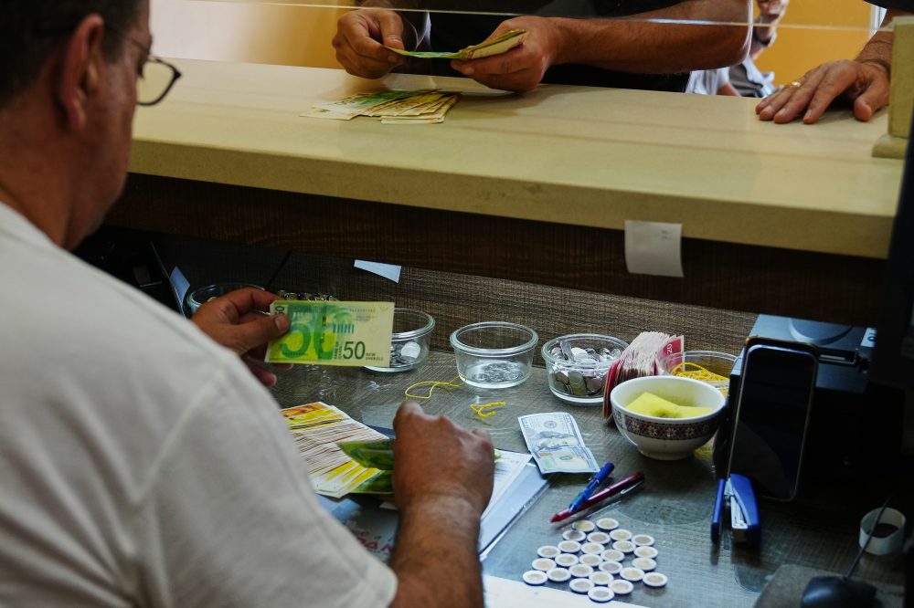 In the Israeli-occupied West Bank, too much cash is breaking the economy