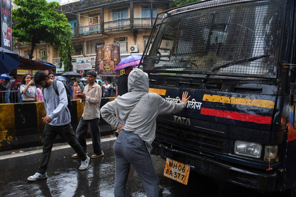 A single photo captures the resolve behind India’s “Cockroach” protests