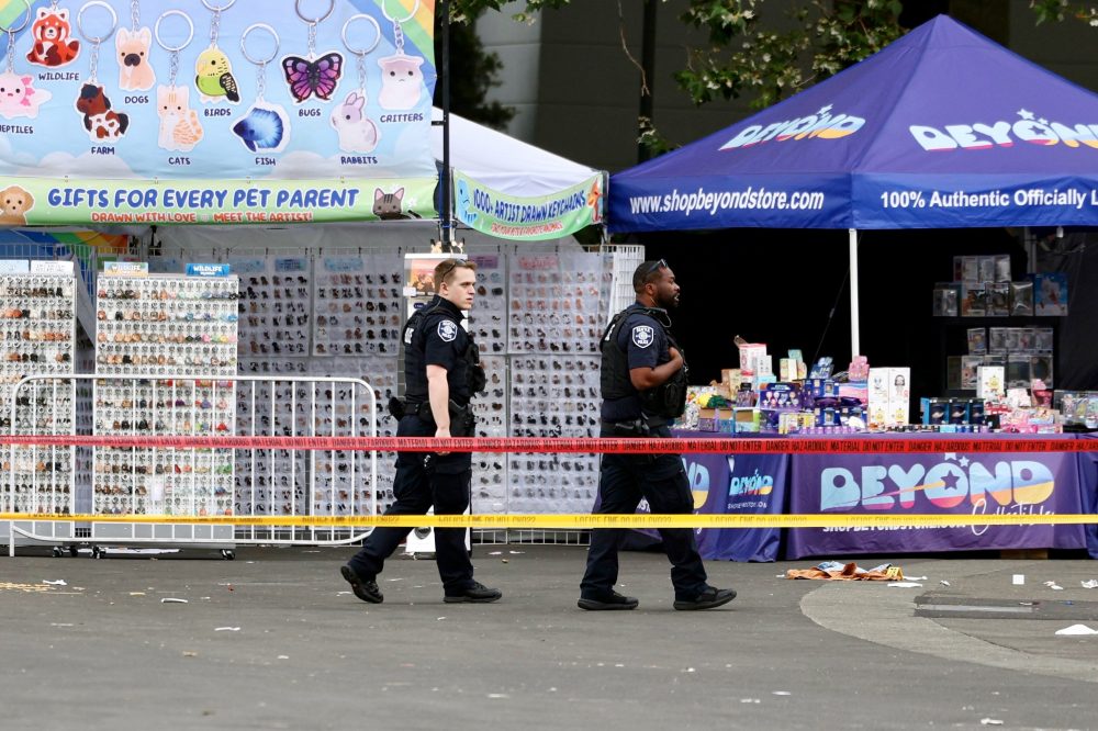 Police arrest 1 person and search for another after Seattle festival shooting that killed 3