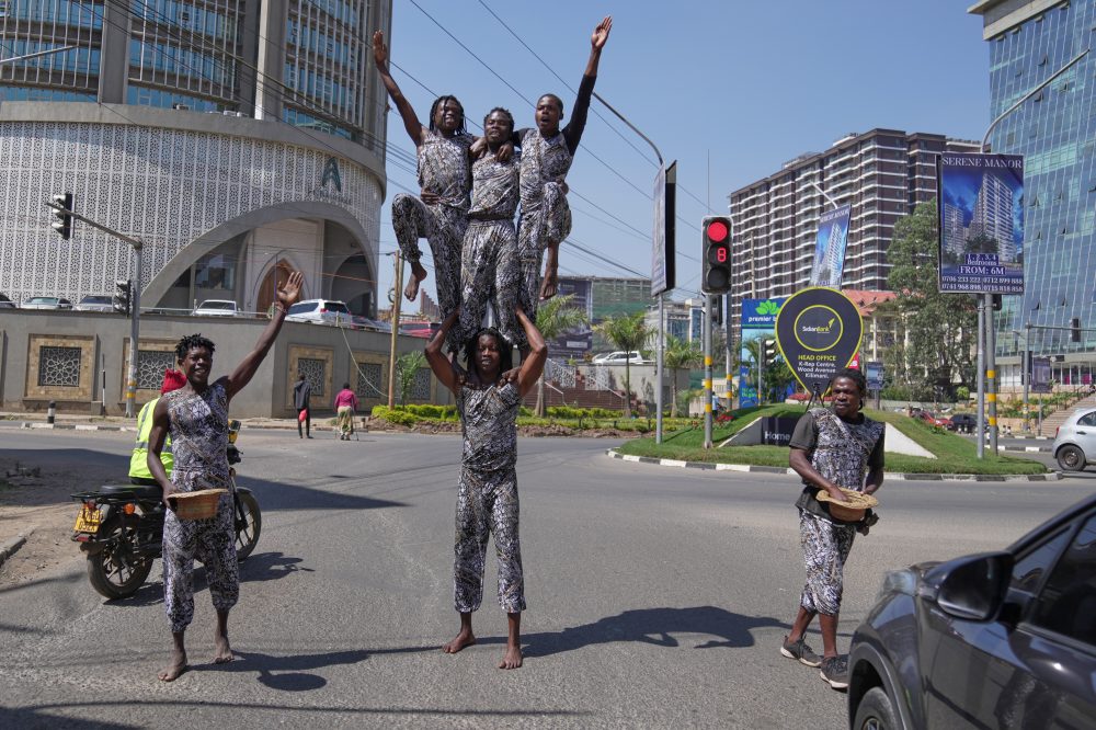 Street acrobats entertain motorists stuck in the Kenyan capital’s notorious traffic