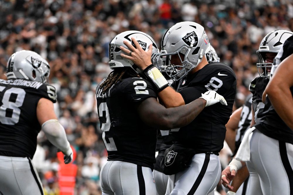 Kirk Cousins hits 301 career TD passes as Raiders open the season with a 27-13 win over Dolphins