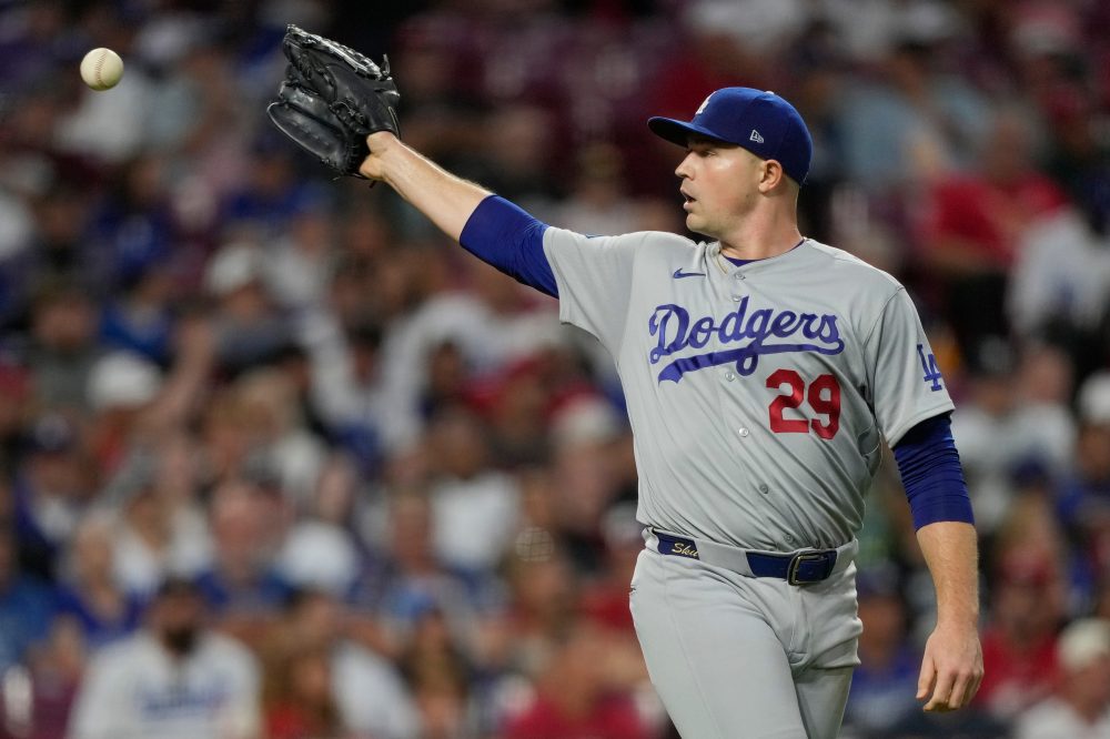 A quiet toast as the Dodgers clinch record-tying 14th straight playoff spot