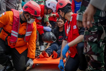 Families desperate for news as 129 still missing four days after capsize of ship in Indonesia’s Java Sea